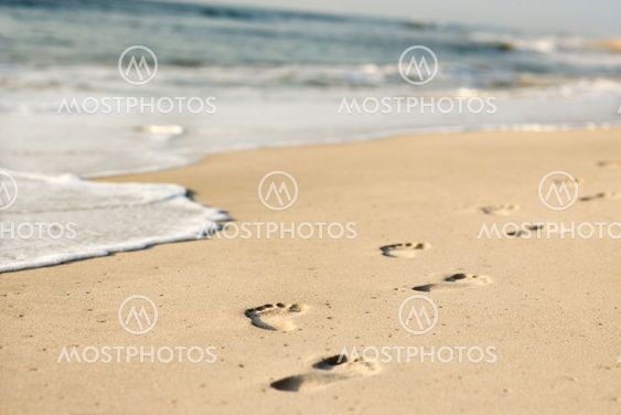 Coastline with footprints.