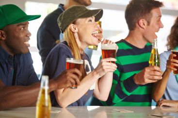 Celebration, beer and friends in pub with sports game,...