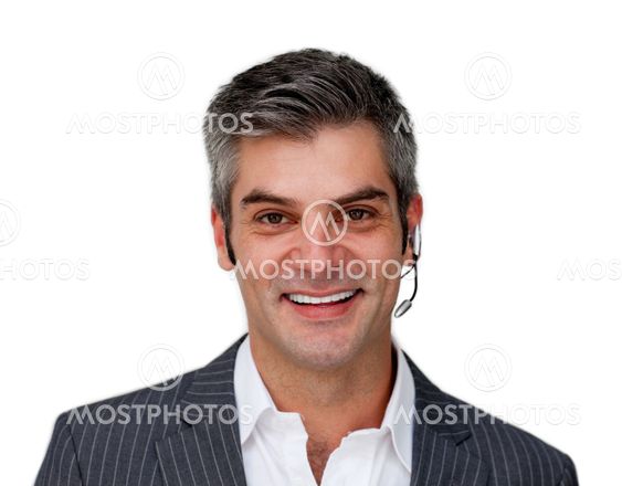 Smiling mature businessman with headset on
