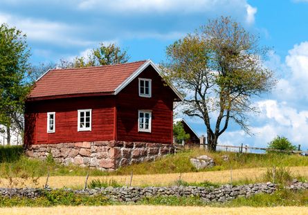 Swedish farm with typical red wooden buildings