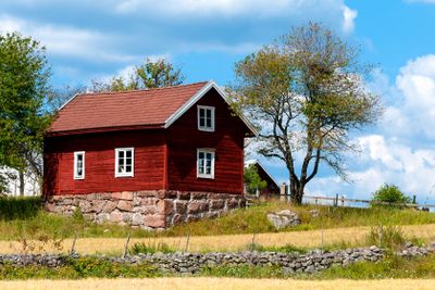 Swedish farm with typical red wooden buildings