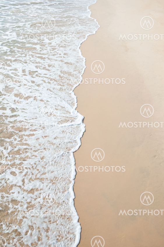 Sand beach and wave sea