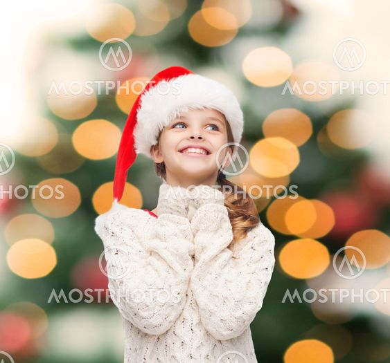 dreaming girl in santa helper hat