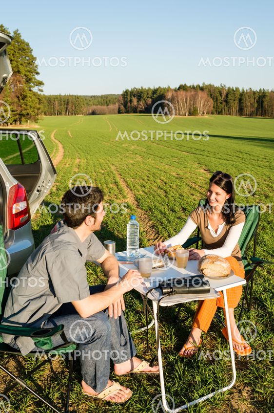 Camping car young couple enjoy picnic countryside