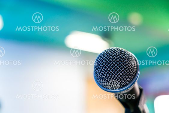 Black microphone in conference room ( Filtered image...