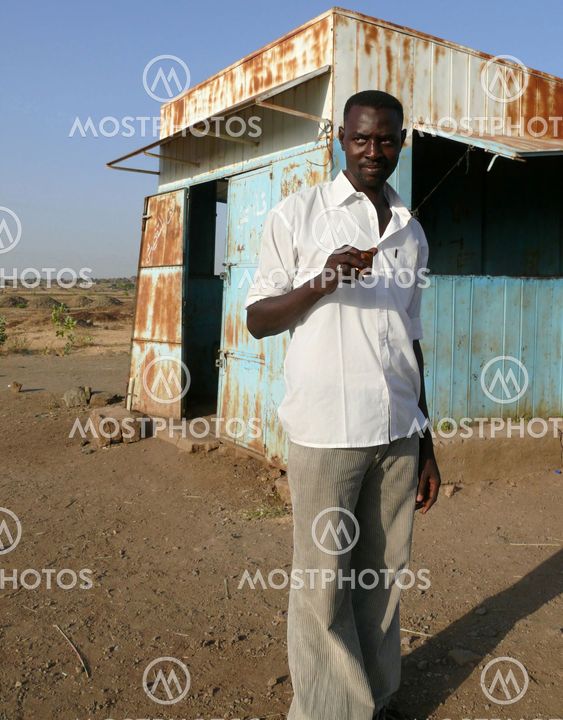 KHARTOUM, SUDAN - 22 NOVEMBER 2008: An unknown man - a policeman standing next to the police post.