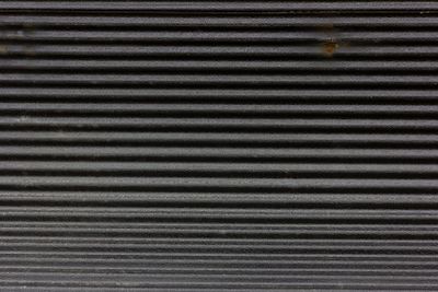 Old black corrugated zinc with rust for background, Metal...