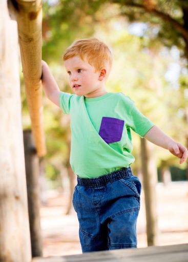 Boy, child and walking with playground for fun...