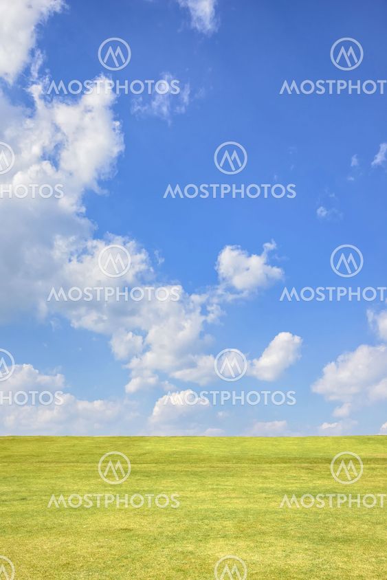 green hill with blue sky