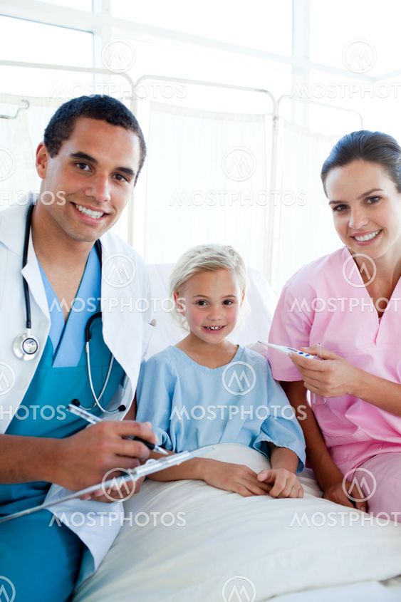 A nurse taking her patient temperature with a thermometer