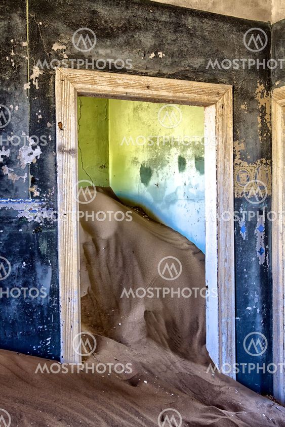 an house overtaken by dune sand at kolmanskop near luderitz namibia africa