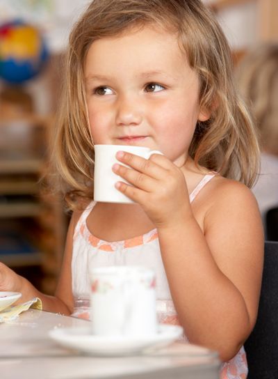 Young Boy Having Tea at Montessori/Pre-School