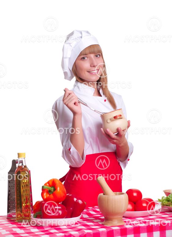 Attractive cook woman a over white background