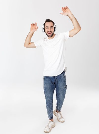 Full length of a handsome cheerful man