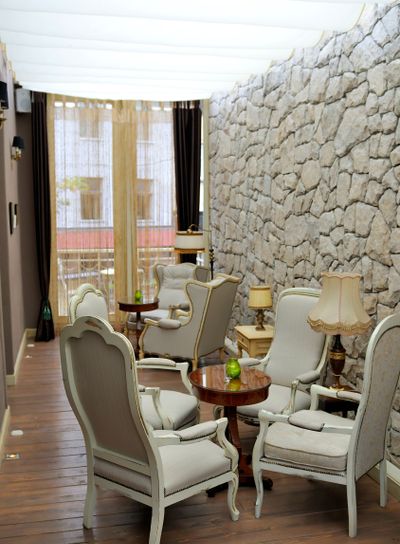 Picture of a retro-style decorated room with relaxed...