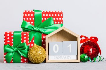 1 january. Christmas composition on colored background...