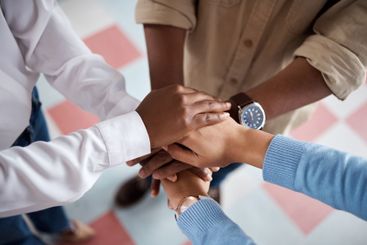 Business, hands pile and people in office together,...