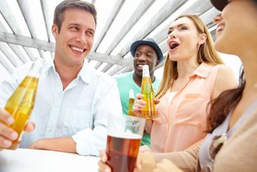 Alcohol, drinking and group of friends at pub together...