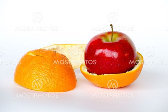 Apple inside an orange