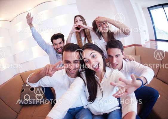 group of friends taking selfie