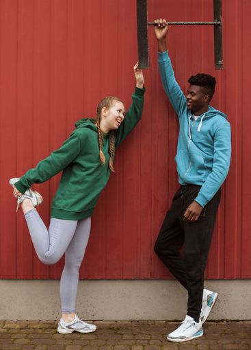 teenagers training together outdoors