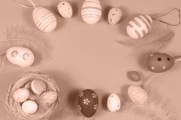 Easter frame with eggs and feathers. Demonstrating color...