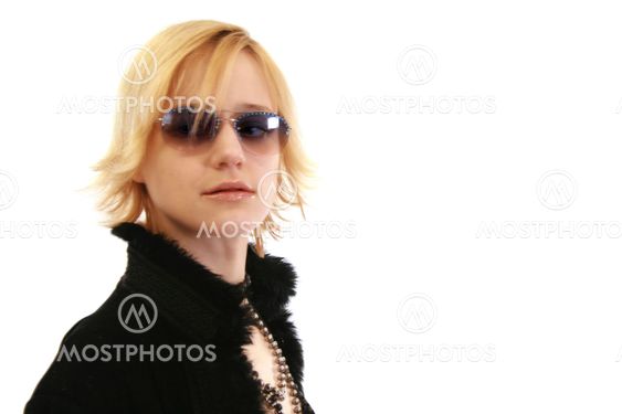 Woman in sunglasses and furry coat