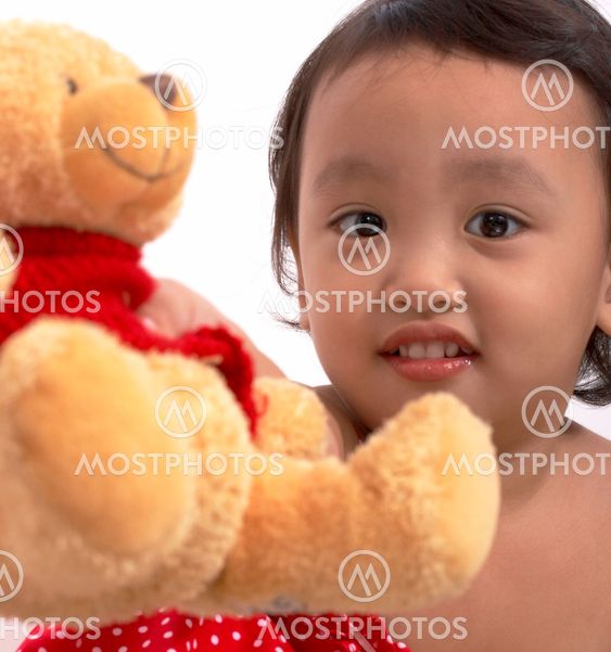 Girl Playing With Her Teddy