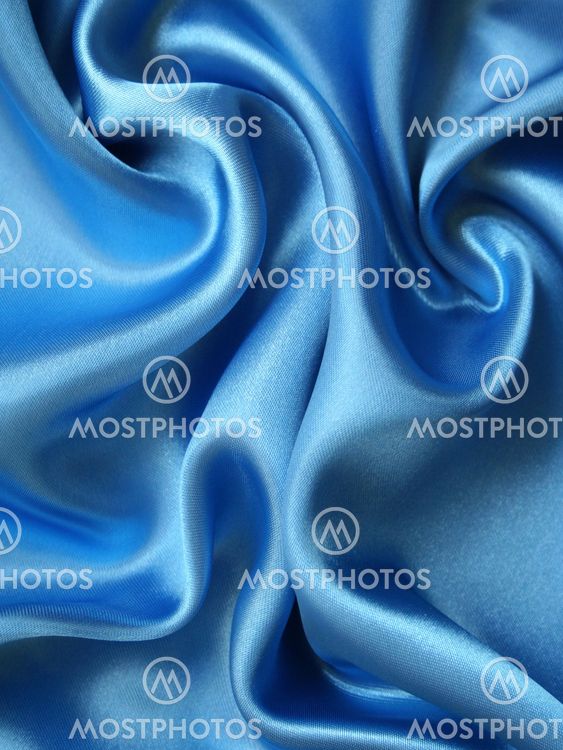 Smooth elegant blue silk as background