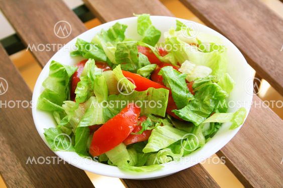 Healthy vegetarian Salad on the white plate