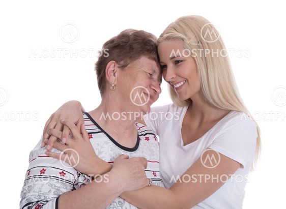 Portrait of real grandmother with her granddaughter.