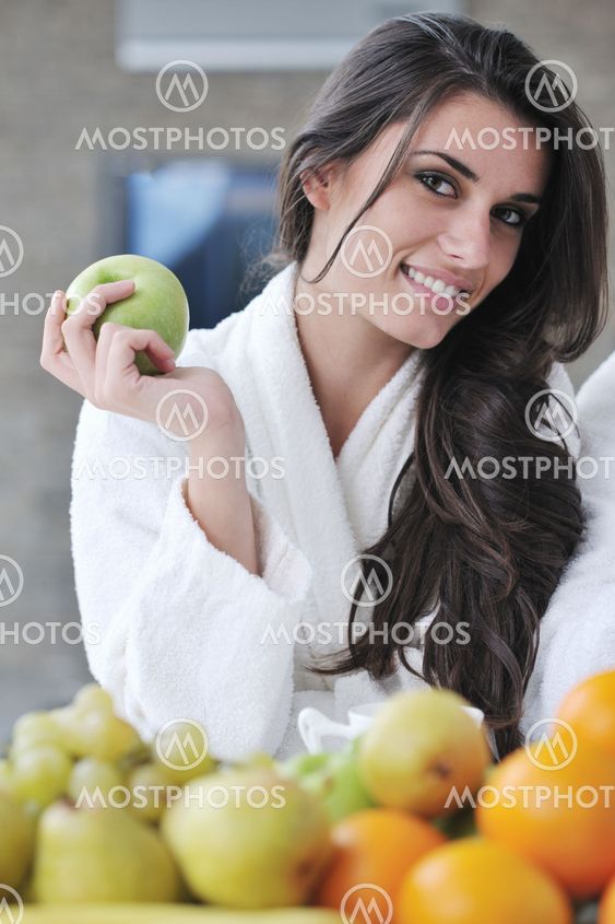 young couple have fun in modern kitchen