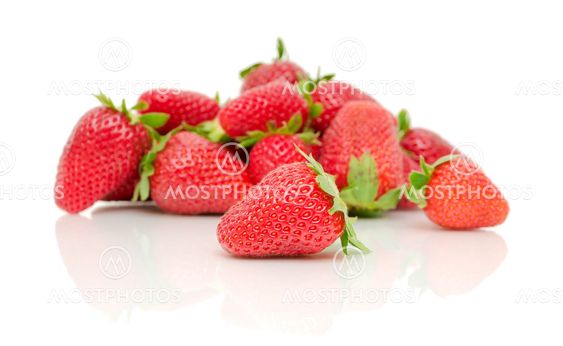 a bunch of strawberries on a white background