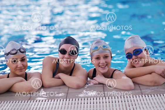 happy teen group at swimming pool
