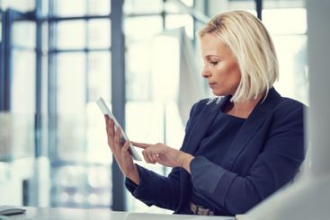 Property agent, tablet or businesswoman in office for...