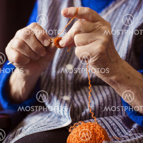 Senior woman knitting