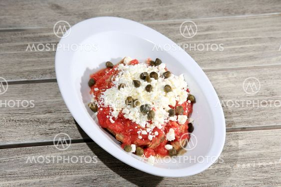 fresh tomato with cheese on a bread