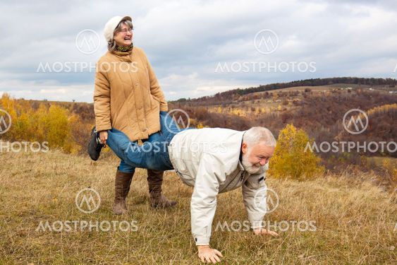 Mature couple playing