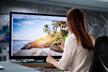 Creative Woman Working at Desk as Graphic Designer