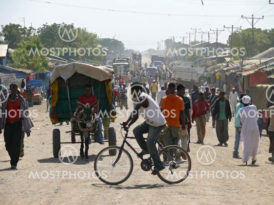 Roby, Ethiopia - November 23, 2008: Unfamiliar city residents per hour - the peak.