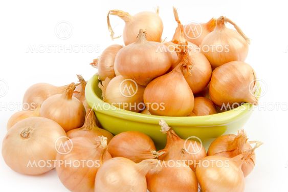 A bowl full of onions on white background