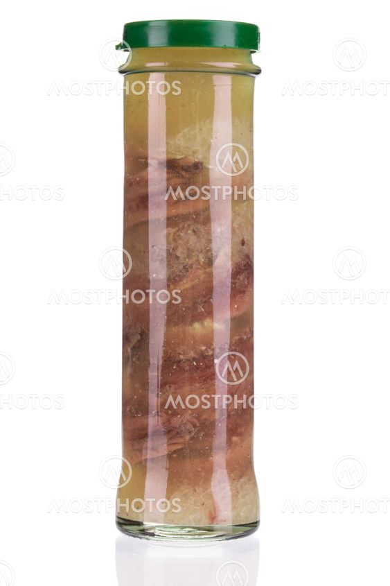 "Jar of anchovy fillets." av indigolotos Mostphotos