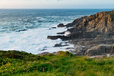 Rough and rocky shore at Malin Head, Ireland's...