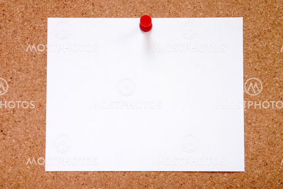 Blank paper stuck to a notice board, ready for your message.