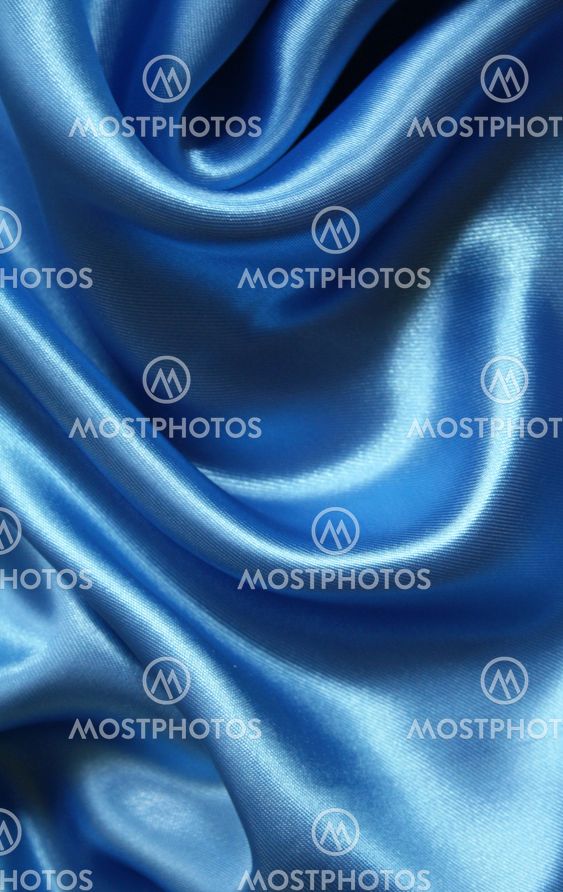 Smooth elegant blue silk as background