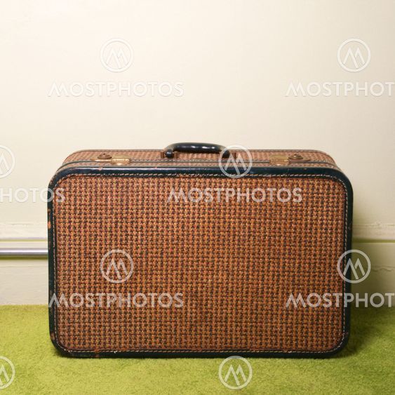 Suitcase on floor.