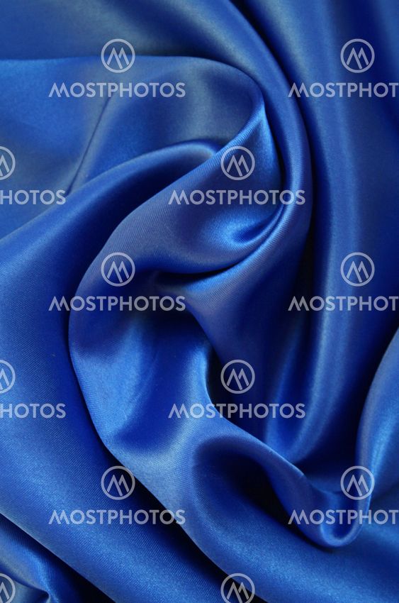 Smooth elegant blue silk as background