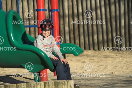 Young Boy on Slide