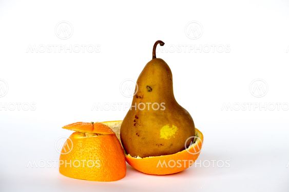 Pear inside an orange
