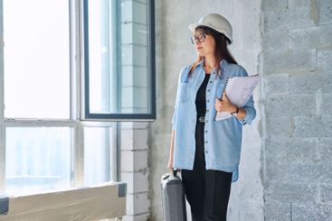 Portrait of female architect decorator of final...